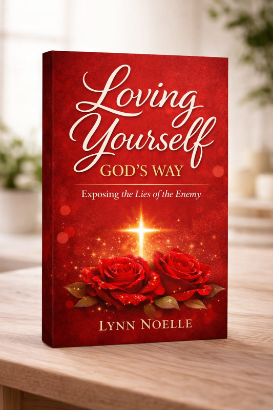 Book titled 'Loving Yourself God's Way' by Lynn Noelle on a wooden surface with a blurred background.